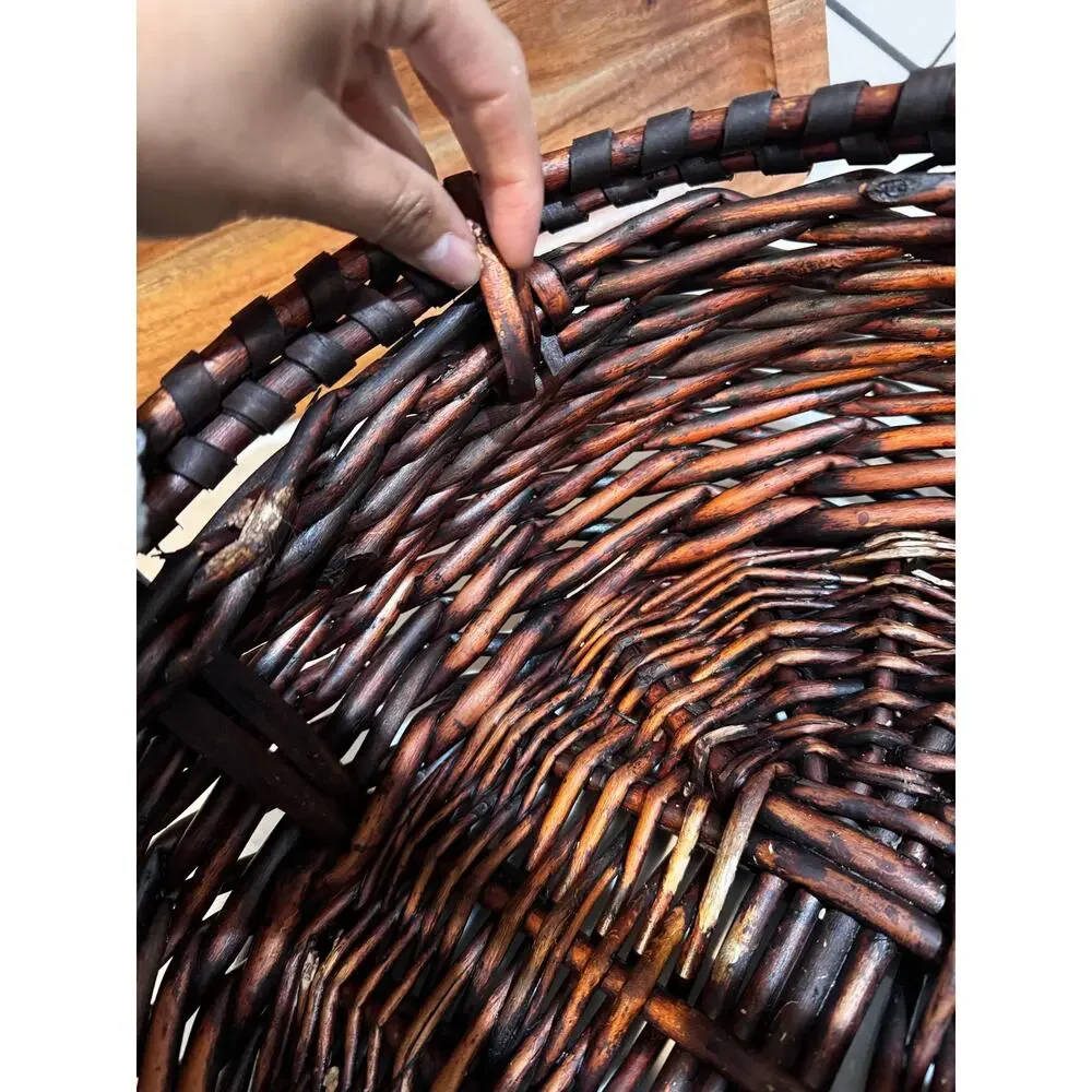 dark stained willow basket rustic handwoven texture sturdy center handle vintage